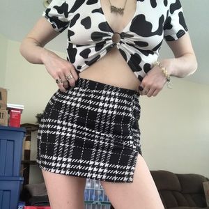 Black and white houndstooth print mini skirt with slit